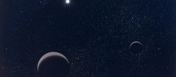 Pluton et son plus grand satellite Charon - Sputnik Afrique