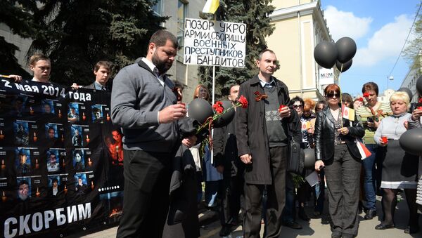 Акция памяти по погибшим в Одессе 2 мая 2014 года в Москве - Sputnik Afrique