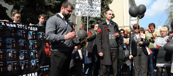 Акция памяти по погибшим в Одессе 2 мая 2014 года в Москве - Sputnik Afrique