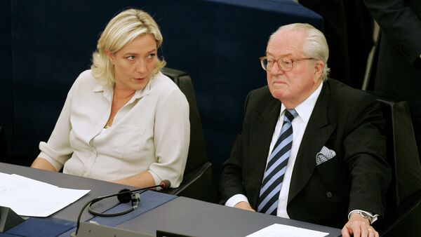 Jean-Marie Le Pen, right, and his daughter Marine Le Pen sit at the European Parliament, in Strasbourg, eastern France - Sputnik Afrique