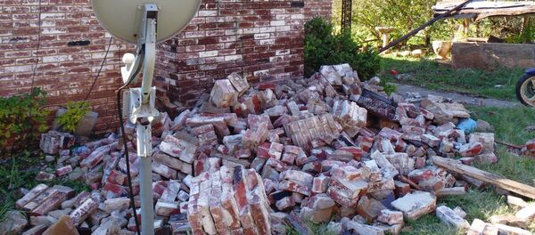 A damage home in central Oklahoma from the magnitude 5.6 earthquake on Nov. 6, 2011. - Sputnik Afrique