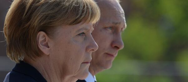 Le président russe Vladimir Poutine et la chancelière allemande Angela Merkel - Sputnik Afrique