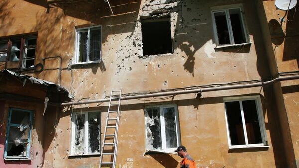 Maison endommagée par les tirs à Donetsk - Sputnik Afrique