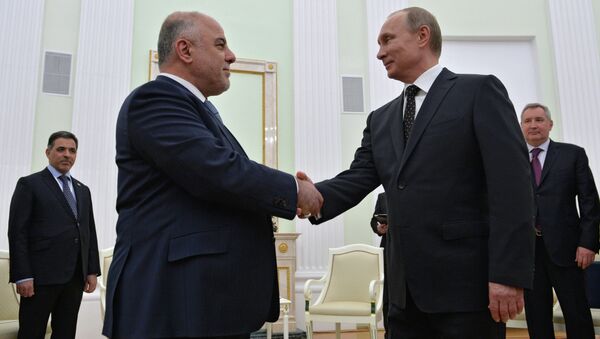 Le président russe Vladimir Poutine et le premier ministre irakien Haïdar al-Abadi - Sputnik Afrique