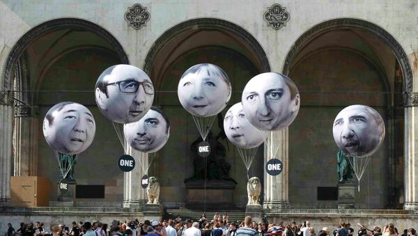 Balloons made by the 'ONE' campaigning organisation depicting leaders of the countries members of the G7 are pictured in Munich, Germany, June 5, 2015. - Sputnik Afrique