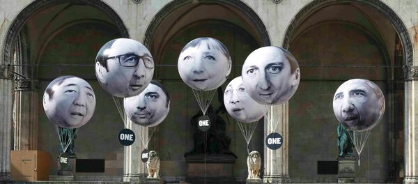 Balloons made by the 'ONE' campaigning organisation depicting leaders of the countries members of the G7 are pictured in Munich, Germany, June 5, 2015. - Sputnik Afrique