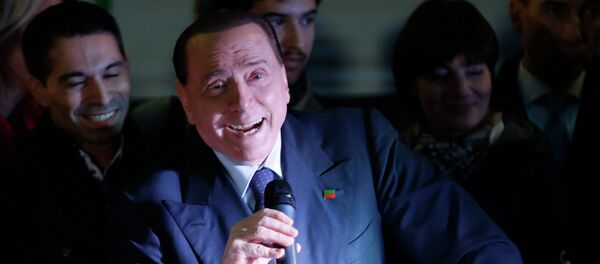 Silvio Berlusconi speaks during a Forza Italia party rally 'No Tax Day' in Milan - Sputnik Afrique