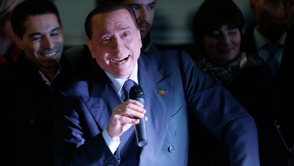 Silvio Berlusconi speaks during a Forza Italia party rally 'No Tax Day' in Milan - Sputnik Afrique