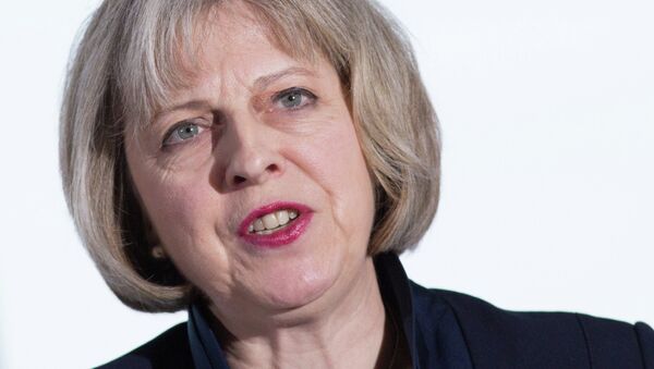 British Home Secretary Theresa May attends a Conservative Party press conference in central London on January 5, 2015 - Sputnik Afrique
