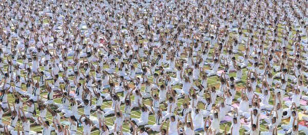 Des exercices de yoga - Sputnik Afrique