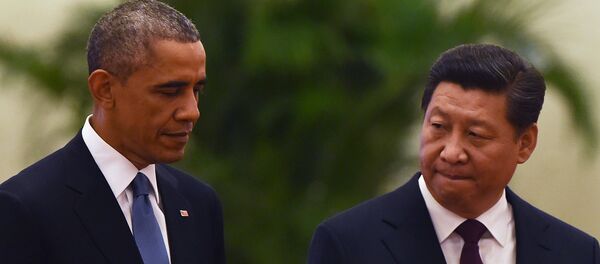 US President Barack Obama (L) walks with Chinese President Xi Jinping - Sputnik Afrique