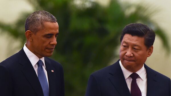 US President Barack Obama (L) walks with Chinese President Xi Jinping - Sputnik Afrique