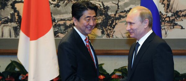 Vladimir Poutine et Shinzo Abe. Archive photo - Sputnik Afrique