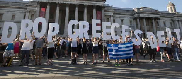 Demonstrators gather to protest against the European Central Bank's handling of Greece's debt repayments, in Trafalgar Square in London, Britain, June 29, 2015. - Sputnik Afrique