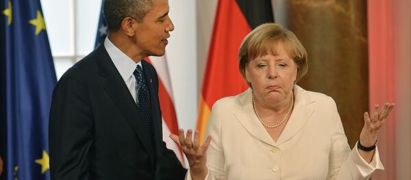 German Chancellor Angela Merkel gestures next to US President Barack Obama - Sputnik Afrique