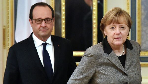 Francois Hollande et Angela Merkel - Sputnik Afrique
