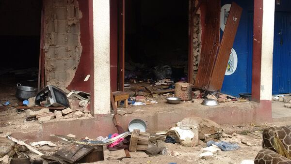 Debris lays strewn over the area after a bomb exploded at a mosque in Jos, Nigeria - Sputnik Afrique
