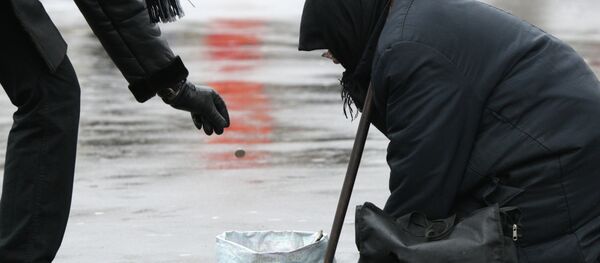 Une femme qui fait la manche - Sputnik Afrique