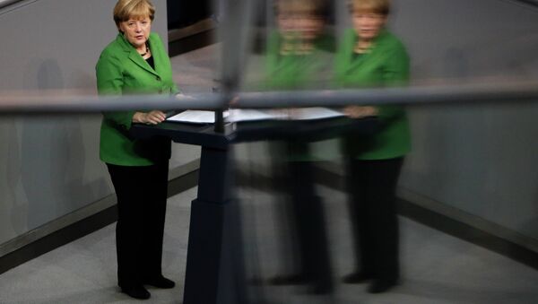 German Chancellor Angela Merkel delivers her speech at the German parliament Bundestag in Berlin. - Sputnik Afrique
