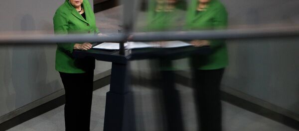 German Chancellor Angela Merkel delivers her speech at the German parliament Bundestag in Berlin. German Chancellor Angela Merkel delivers her speech at the German parliament Bundestag in Berlin. - Sputnik Afrique