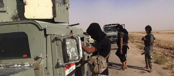 Islamic State of Iraq and the Levant (ISIL) militants Islamic State of Iraq and the Levant (ISIL) militants - Sputnik Afrique