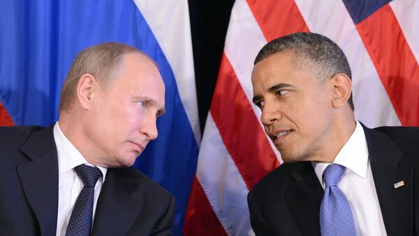 US President Barack Obama (R) listens to Russian President Vladimir Putin - Sputnik Afrique