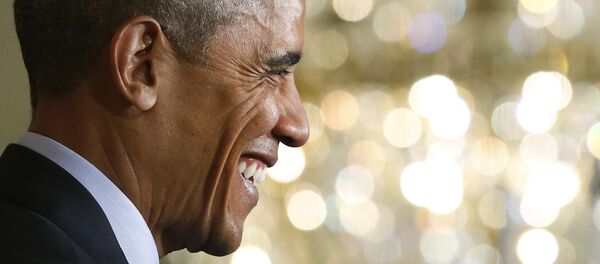 U.S. President Barack Obama smiles after being asked whether the events of the past few days constituted his best week, as he and Brazil's President Dilma Rousseff hold a joint news in the East Room of the White House in Washington June 30, 2015. - Sputnik Afrique