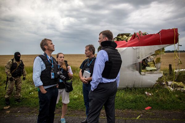 Fragment du Boeing abattu en Ukraine Fragment du Boeing abattu en Ukraine - Sputnik Afrique
