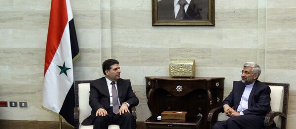 Saeed Jalili, who heads the Iranian Supreme National Security Council, meets with Syrian Prime Minister Wael al-Halqi Saeed Jalili, who heads the Iranian Supreme National Security Council, meets with Syrian Prime Minister Wael al-Halqi - Sputnik Afrique