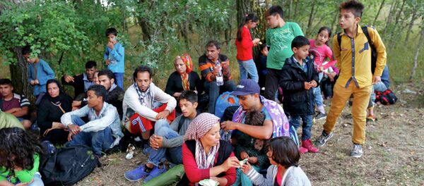 Migrants - Sputnik Afrique