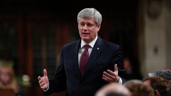 Canada's Prime Minister Stephen Harper speaks during Question Period in the House of Commons on Parliament Hill in Ottawa February 17, 2015 - Sputnik Afrique