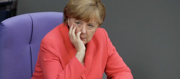 German Chancellor Angela Merkel attends a meeting of the German federal parliament, Bundestag, in Berlin, Germany, Friday, July 17, 2015. German Chancellor Angela Merkel attends a meeting of the German federal parliament, Bundestag, in Berlin, Germany, Friday, July 17, 2015. - Sputnik Afrique