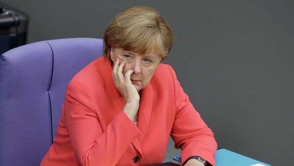 German Chancellor Angela Merkel attends a meeting of the German federal parliament, Bundestag, in Berlin, Germany, Friday, July 17, 2015. - Sputnik Afrique