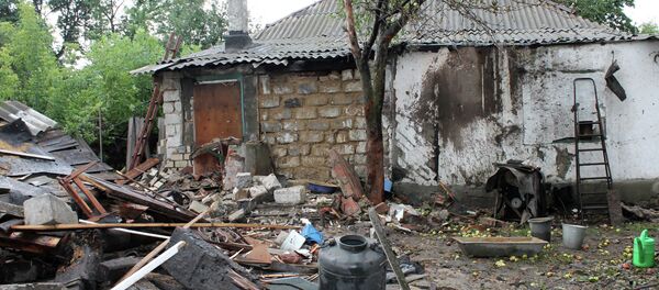 Последствия обстрелов Горловки в Донецкой области Последствия обстрелов Горловки в Донецкой области - Sputnik Afrique