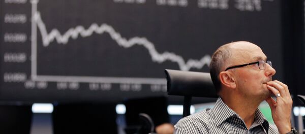 A trader watches his screens at the stock market in Frankfurt, Germany - Sputnik Afrique