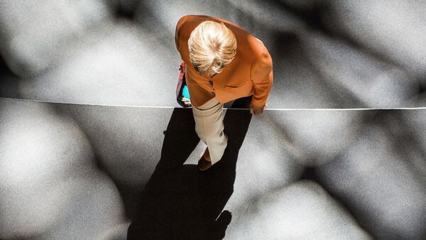German chancellor Angela Merkel leaves after a session at the Bundestag lower house of parliament on the Greek crisis on July 1, 2015 in Berlin - Sputnik Afrique