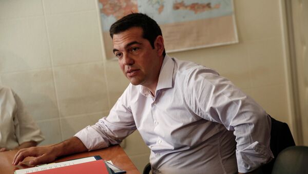 Greece's Prime minister Alexis Tsipras presides over a ministerial meeting regarding the migration crisis in Athens, Friday, Aug. 7, 2015. - Sputnik Afrique