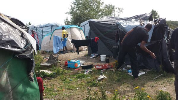 Migrants de Calais: un point chaud au bord d'une mer froide Migrants de Calais: un point chaud au bord d'une mer froide - Sputnik Afrique