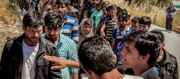 Refugees from Afghanistan are pictured on the island of Lesbos near Moria, Greece - Sputnik Afrique