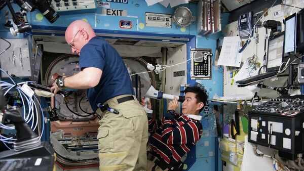 NASA, astronaute Scott Kelly et astronaute Kimiya Yui - Sputnik Afrique