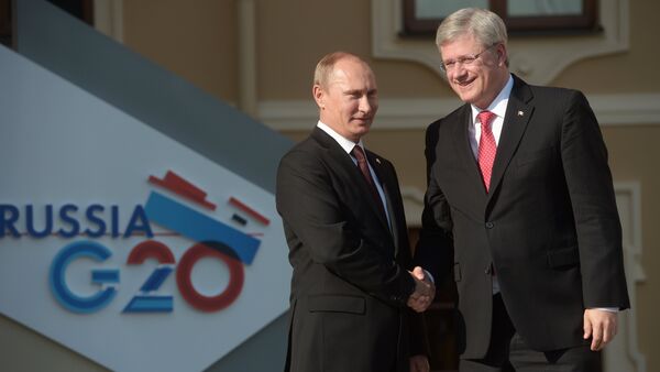 Le président russe Vladimir Poutine et le premier ministre canadien Stephen Harper - Sputnik Afrique