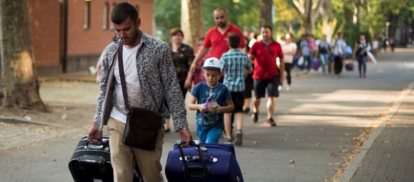 Migrants - Sputnik Afrique