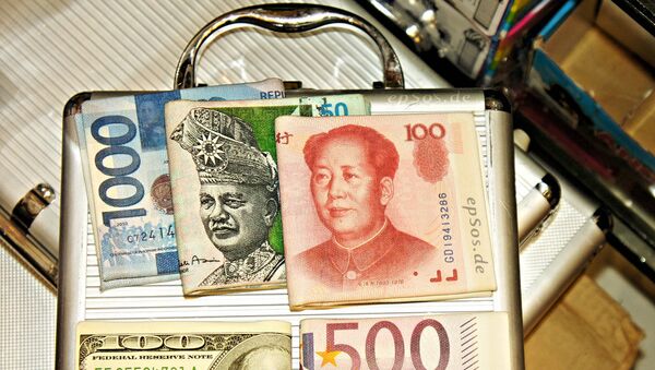 Chinese yuan toghether with other currencies - the dollar, the euro, the Malaysian ringgit and the Indonesian rupiah. - Sputnik Afrique