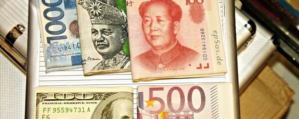 Yuans et dollars - Sputnik Afrique