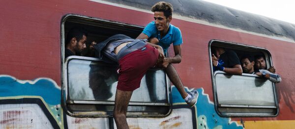 Migrants - Sputnik Afrique