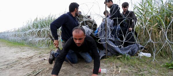 migrants - Sputnik Afrique