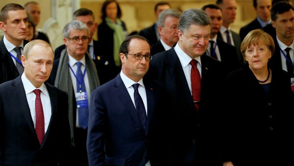 Vladimir Poutine, François Hollande, Piotr Porochenko et Angela Merkel (archives) - Sputnik Afrique