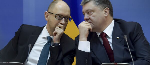 Le premier ministre ukrainien Arseni Iatseniouk et le président ukrainien Piotr Porochenko - Sputnik Afrique