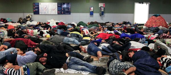 Migrants - Sputnik Afrique