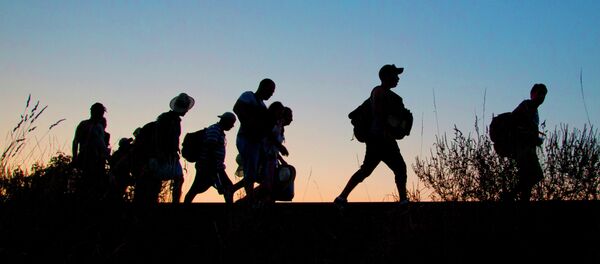 migrants - Sputnik Afrique